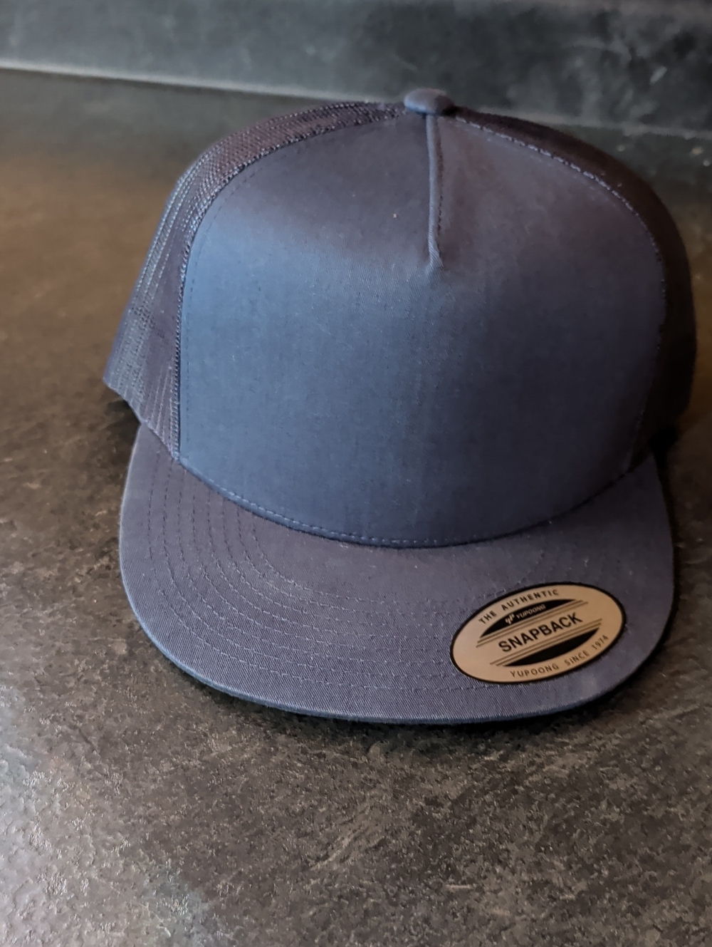 Yupoong Solid Navy Snapback Straight Beak Trucker Hat
